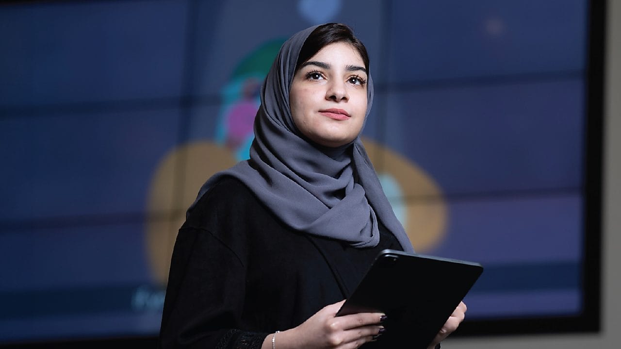 Woman holding a tablet