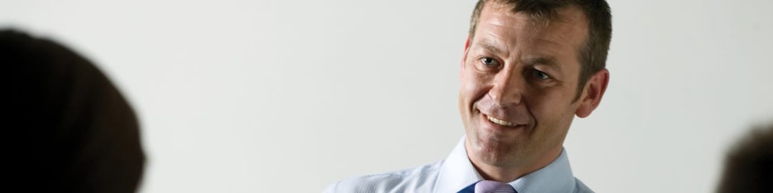 Man presenting at a meeting