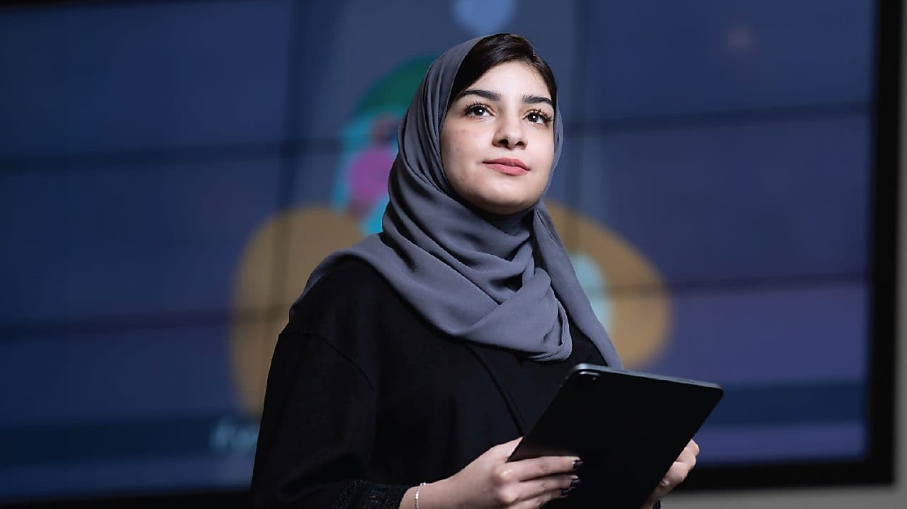 Woman holding a tablet