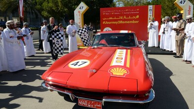 Car in front of the Journey to remember banner