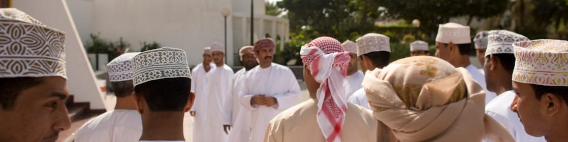 Traditionally dressed Omani gathering