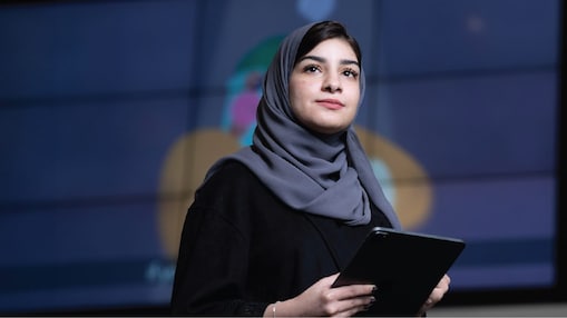 Woman holding a tablet