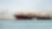 Large tanker at sea loaded with container crates