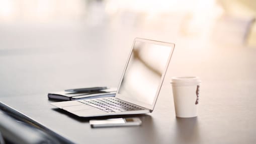 laptop coffee on desk