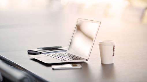 laptop coffee on desk