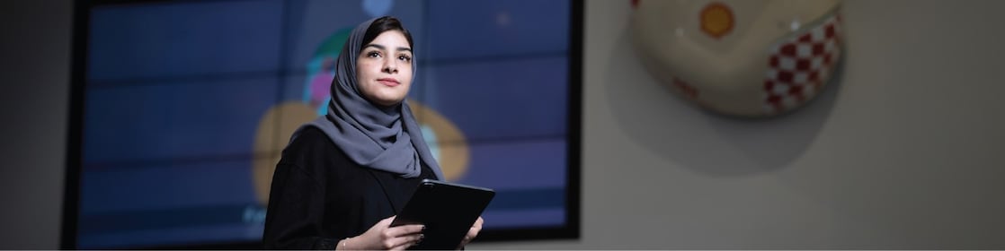 Woman holding a tablet