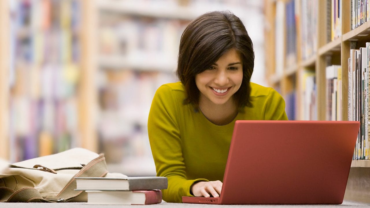 Woman looking at her laptop screen