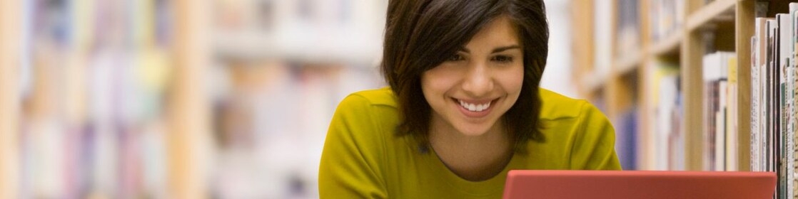 Woman looking at her laptop screen