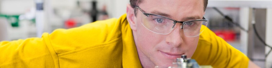 Collection of images showing employees and graduates at work