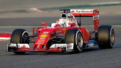 A red Scuderia Ferrari sits on a racing track, an example of Shell Helix Ultra’s Innovation Partnership