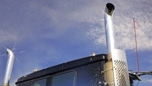 Roof and top of a truck showing exhaust pipes